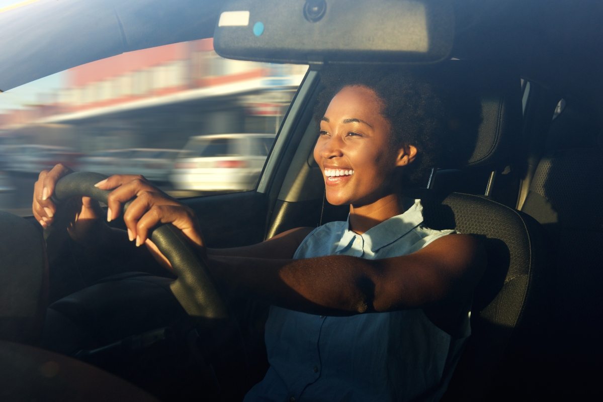 woman driving happily